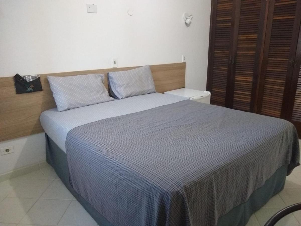 Pousada Parque Suites Estacionamento E Piscina Гуаружа Екстериор снимка
