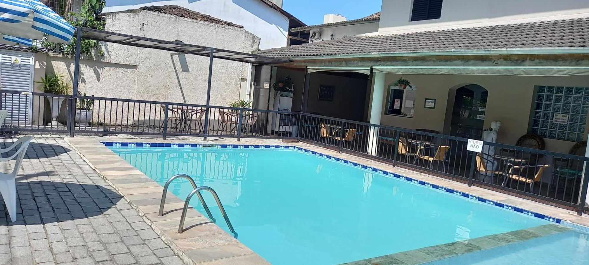 Pousada Parque Suites Estacionamento E Piscina Гуаружа Екстериор снимка