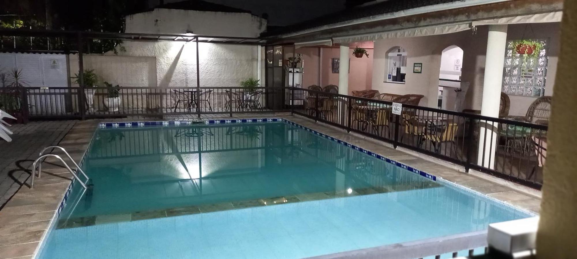Pousada Parque Suites Estacionamento E Piscina Гуаружа Екстериор снимка