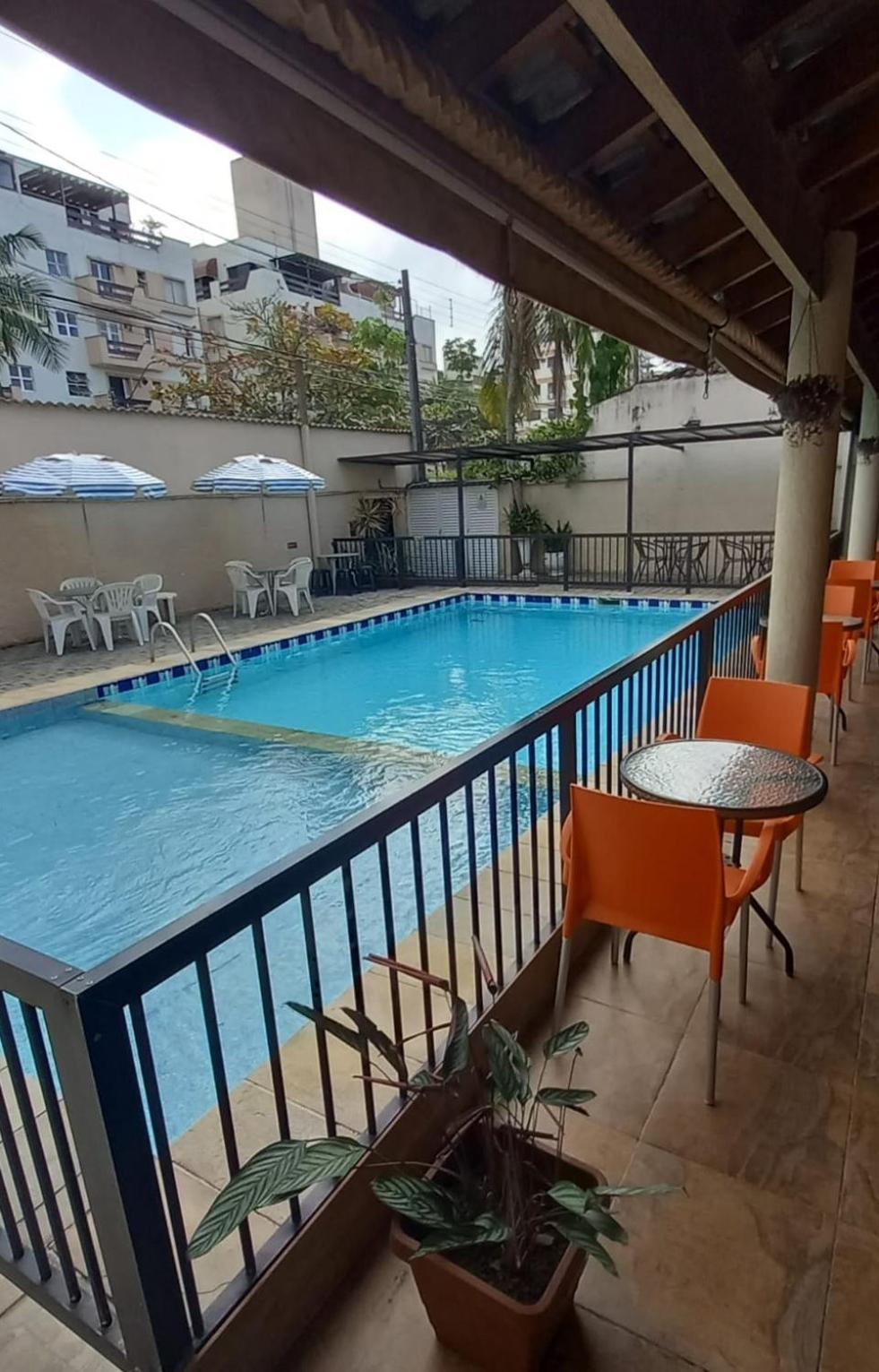 Pousada Parque Suites Estacionamento E Piscina Гуаружа Екстериор снимка